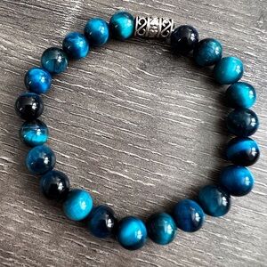 Beautiful tigers eye AAAA+ natural aqua blue gemstone bracelet.